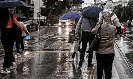 καιρός βροχή καταιγίδες ομπρέλες